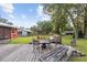 Spacious deck with seating area and view of backyard at 2810 Se 8Th St, Ocala, FL 34471