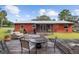 Backyard deck with seating area and view of the house at 2810 Se 8Th St, Ocala, FL 34471