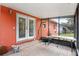 Covered patio with tiled floor and access to backyard at 2810 Se 8Th St, Ocala, FL 34471