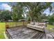 Wooden deck with seating area and view of the backyard at 2810 Se 8Th St, Ocala, FL 34471