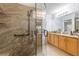 Updated bathroom with granite vanity, walk-in shower, and grab bars at 7290 Se 172Nd Legacy Ln, The Villages, FL 32162