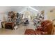 Expansive art studio featuring a leather chair and ample workspace at 2210 Se Laurel Run Dr, Ocala, FL 34471