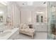 Modern bathroom with a large shower and double vanity at 2210 Se Laurel Run Dr, Ocala, FL 34471