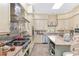 Bright kitchen featuring an island, stainless steel appliances, and ample cabinetry at 2210 Se Laurel Run Dr, Ocala, FL 34471