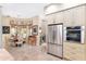 Modern kitchen with stainless steel appliances and light-colored cabinetry at 2210 Se Laurel Run Dr, Ocala, FL 34471