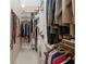 Spacious walk-in closet with ample hanging and shelving space at 2210 Se Laurel Run Dr, Ocala, FL 34471