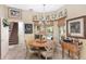 Charming breakfast nook with a round table, pool view, and built-in cabinetry at 2210 Se Laurel Run Dr, Ocala, FL 34471