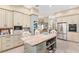 Updated kitchen featuring stainless steel appliances and ample cabinet space at 2210 Se Laurel Run Dr, Ocala, FL 34471