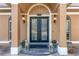 Elegant double front doors with decorative glass at 2210 Se Laurel Run Dr, Ocala, FL 34471