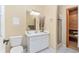 Clean bathroom with white vanity and a private sauna at 2210 Se Laurel Run Dr, Ocala, FL 34471