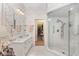 Elegant bathroom with a large shower and walk-in closet at 2210 Se Laurel Run Dr, Ocala, FL 34471