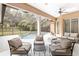 Inviting pool and patio area with ample seating for entertaining at 2210 Se Laurel Run Dr, Ocala, FL 34471