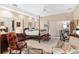 Spacious main bedroom with a large bed and plenty of natural light at 2210 Se Laurel Run Dr, Ocala, FL 34471