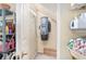 Well-organized garage storage area with shelving and vacuum system at 2210 Se Laurel Run Dr, Ocala, FL 34471