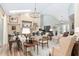 Bright living area with hardwood floors, a stone fireplace and ample seating at 2210 Se Laurel Run Dr, Ocala, FL 34471