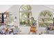 Bright art studio featuring large arched windows and scenic views at 2210 Se Laurel Run Dr, Ocala, FL 34471