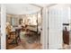 Main bedroom with sitting area, large bed, and built-in shelving at 2210 Se Laurel Run Dr, Ocala, FL 34471