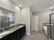 Double vanity bathroom with a soaking tub and separate shower at 5584 Sw 43Rd Ct, Ocala, FL 34474