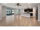 Open kitchen with granite countertops and stainless steel appliances at 5584 Sw 43Rd Ct, Ocala, FL 34474
