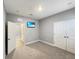 Bedroom with neutral walls, carpeted floor, and double door closet at 5584 Sw 43Rd Ct, Ocala, FL 34474