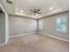 Spacious bedroom with carpet flooring and neutral walls at 5584 Sw 43Rd Ct, Ocala, FL 34474