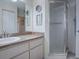 Well-appointed bathroom with a walk-in shower and vanity at 10783 Se 178Th St, Summerfield, FL 34491
