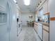 Kitchen with white appliances and ample counter space at 10783 Se 178Th St, Summerfield, FL 34491