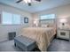 Bright bedroom featuring a comfortable bed and ample space at 10783 Se 178Th St, Summerfield, FL 34491