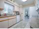 White appliances and light wood cabinets in this kitchen at 10783 Se 178Th St, Summerfield, FL 34491