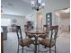 Dining area with table and chairs near living room at 10783 Se 178Th St, Summerfield, FL 34491