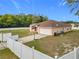 House with a basketball hoop and large front yard at 8335 Se 162Nd Pl, Summerfield, FL 34491