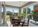 Sunroom with round table and chairs, bright and airy at 11703 Se 91St Cir, Summerfield, FL 34491