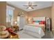 Bright bedroom with comfortable queen-size bed and plenty of storage at 11703 Se 91St Cir, Summerfield, FL 34491