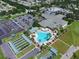 Aerial view of community amenities, including pool and clubhouse at 11703 Se 91St Cir, Summerfield, FL 34491
