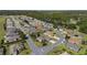 Aerial view of community with numerous homes at 11703 Se 91St Cir, Summerfield, FL 34491