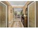 Elegant entryway with decorative console table at 11703 Se 91St Cir, Summerfield, FL 34491