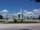 Community fountain with lamp posts and landscaping at 11703 Se 91St Cir, Summerfield, FL 34491