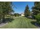 Large backyard with well-manicured lawn at 11703 Se 91St Cir, Summerfield, FL 34491