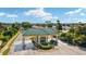 Gated community entrance with guardhouse at 11703 Se 91St Cir, Summerfield, FL 34491