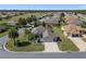 Aerial view highlighting the home's curb appeal and neighborhood at 11703 Se 91St Cir, Summerfield, FL 34491