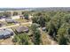 House nestled in a wooded area, seen from above at 14185 Sw 30Th Pl, Ocala, FL 34481