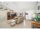 Living room features vaulted ceilings and a large fish tank at 14185 Sw 30Th Pl, Ocala, FL 34481