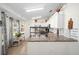 Modern kitchen features a large island with a double sink, and plenty of cabinet space at 14185 Sw 30Th Pl, Ocala, FL 34481