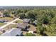 Aerial view showing house, shed, and wooded area at 14185 Sw 30Th Pl, Ocala, FL 34481
