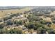 Aerial view of neighborhood featuring houses and open space at 14185 Sw 30Th Pl, Ocala, FL 34481