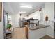 Modern kitchen boasts ample counter space, stainless steel appliances, and a breakfast bar at 14185 Sw 30Th Pl, Ocala, FL 34481