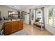 Kitchen features an island with a double sink, ample counter space, and a bay window at 14185 Sw 30Th Pl, Ocala, FL 34481