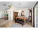 Bright dining room features a rustic wooden table with bench seating, and a built-in hutch at 14185 Sw 30Th Pl, Ocala, FL 34481