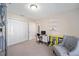 Home office with desk, chair, and built in shelving at 14185 Sw 30Th Pl, Ocala, FL 34481