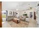 Spacious living area with comfortable seating and built-in shelving at 14185 Sw 30Th Pl, Ocala, FL 34481
